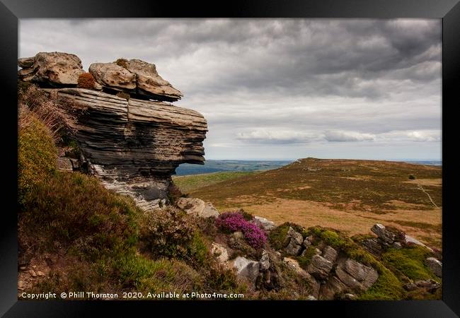 Fantastic rock formations of the Simonside Hills  Framed Print by Phill Thornton