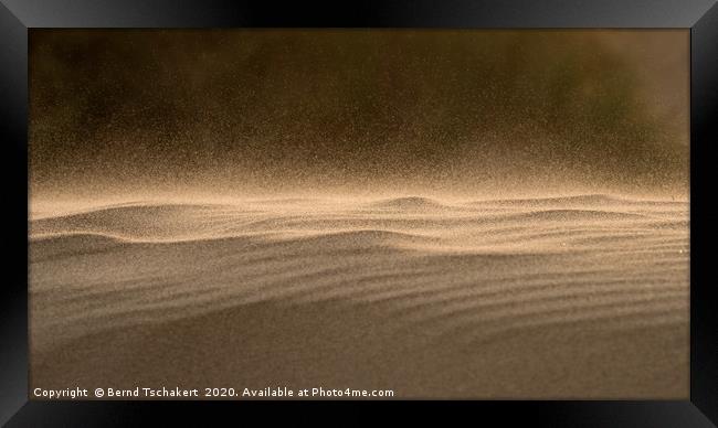 Strong wind blowing sand across dune, Rhossili, UK Framed Print by Bernd Tschakert