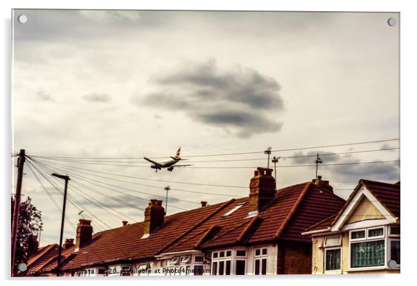 Passenger plane flying over the roofs of residenti Acrylic by Q77 photo