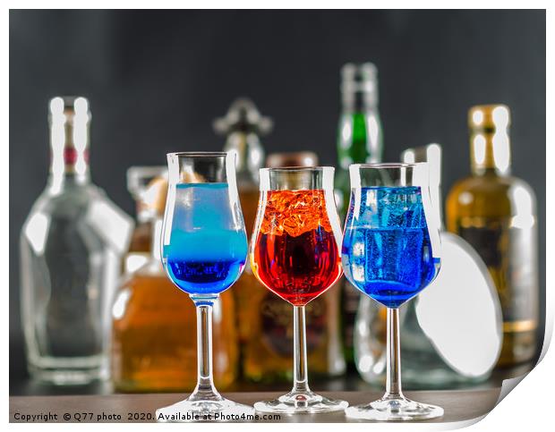 Colorful drink on the background of bottles in ori Print by Q77 photo