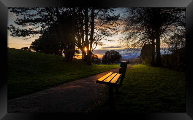 Sunset and a park bench Framed Print by Leighton Collins