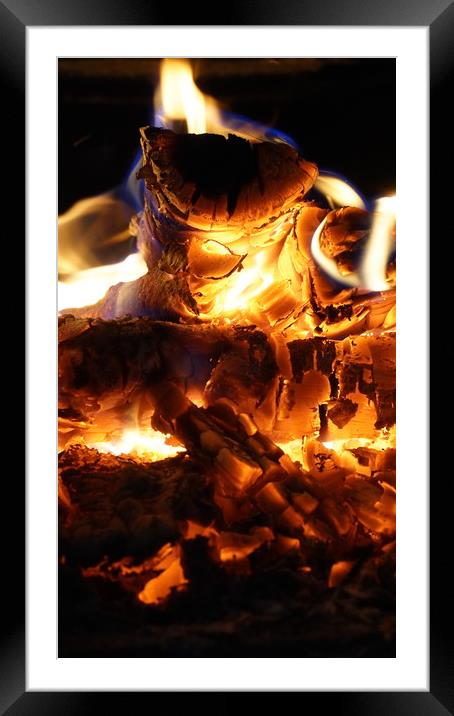 Fireplace with wood burning and glowing heat Framed Mounted Print by Dragos Nicolae Dragomirescu