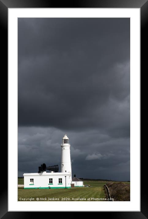 Dark sky behind Nash Point Lighthouse  Framed Mounted Print by Nick Jenkins