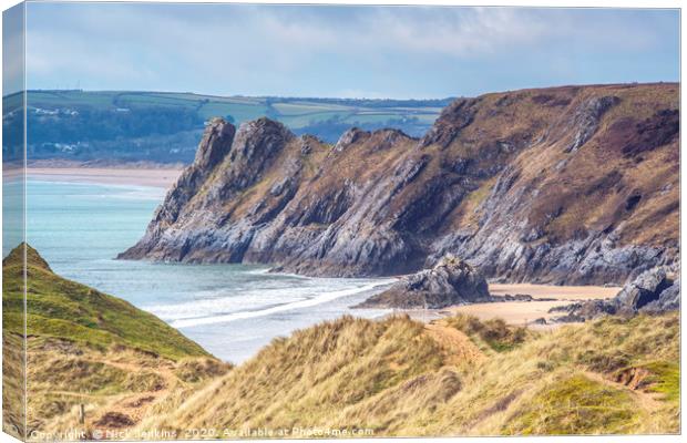 Great Tor overlooking Three Cliffs Bay Gower Wales Canvas Print by Nick Jenkins