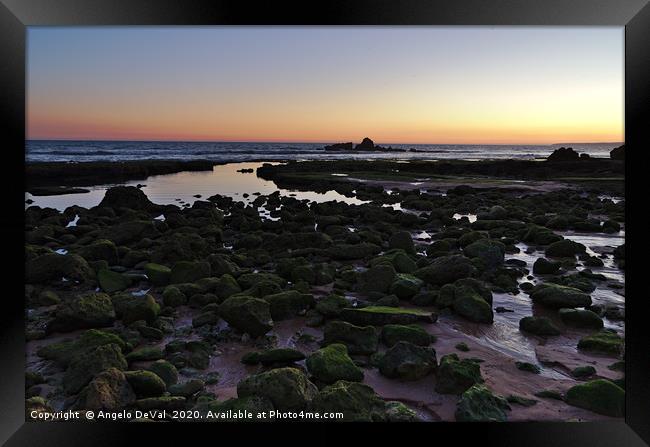Twilight and rocks in Gale beach Framed Print by Angelo DeVal