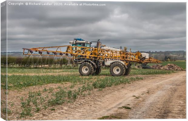 Oilseed Rape Fertilizer Spraying Canvas Print by Richard Laidler