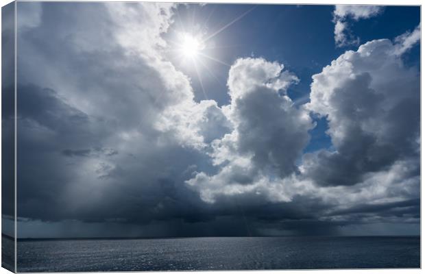 sun and rain over the ocean   Canvas Print by Gail Johnson