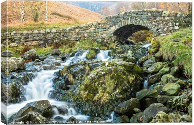 Ashness Bridge in the Lake District Cumbria Canvas Print by Nick Jenkins