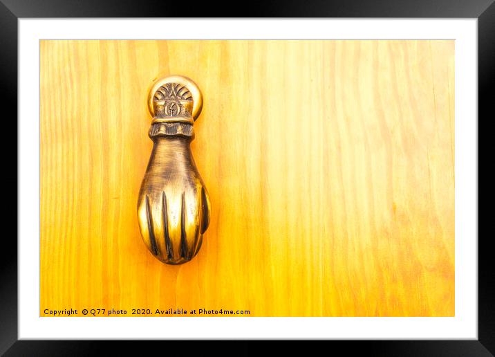 Door with brass knocker in the shape of a hand, be Framed Mounted Print by Q77 photo