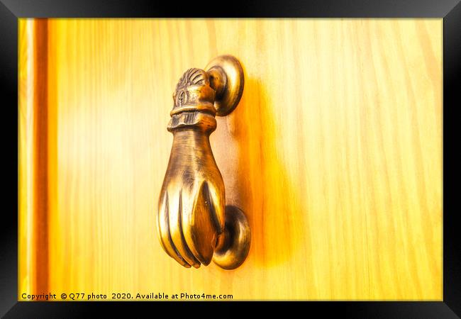 Door with brass knocker in the shape of a hand, be Framed Print by Q77 photo