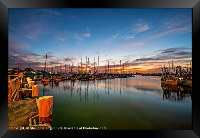 Sunset Over The Marina Framed Print by Shaun Carling