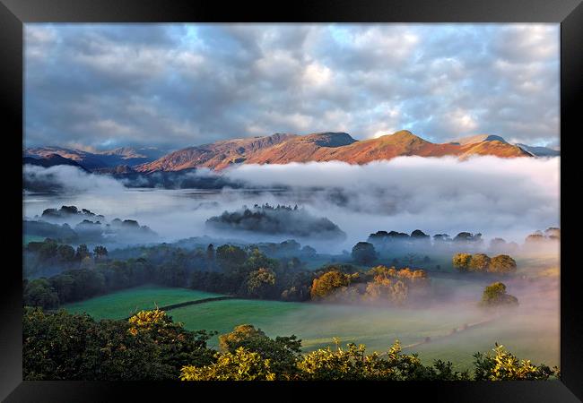 Mists over Derwentwater and Catbells Framed Print by Martin Lawrence