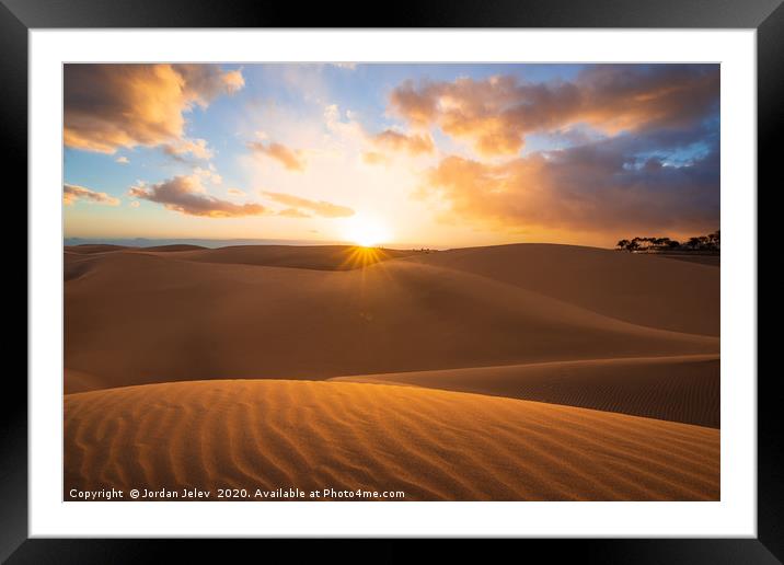 Sunset in the desert, sun and sun rays Framed Mounted Print by Jordan Jelev