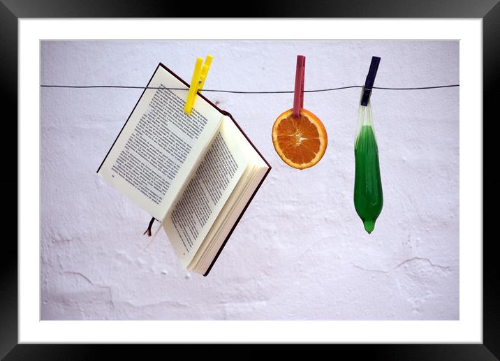 This is a still lfe made with an orange, a book an Framed Mounted Print by Jose Manuel Espigares Garc