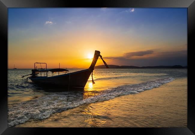 Sunset Scene over sea whit Longtail Boat Framed Print by Jordan Jelev