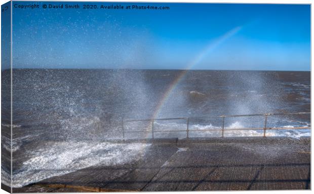 Rainbow in the Spray at high tide at cleethorpes Canvas Print by David Smith
