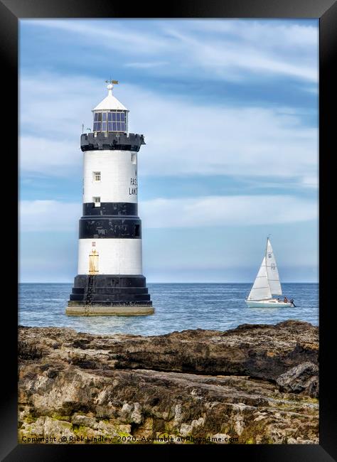 Sailing by Penmon Lighthouse Framed Print by Rick Lindley