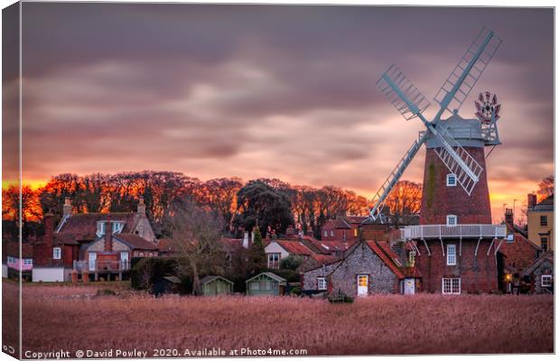 Winter sunrise at Cley Mill Norfolk Canvas Print by David Powley