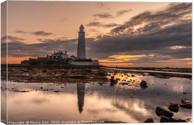 Sunrise at St Mary's Lighthouse Canvas Print by Marcia Reay