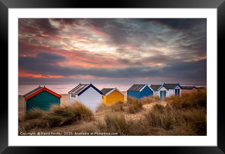 Southwold beach huts at sunrise Suffolk Framed Mounted Print by David Powley