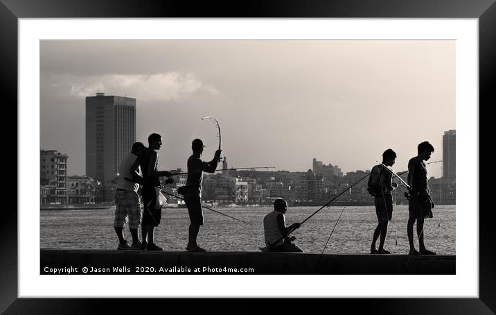 Men fishing from the Malecon wall at dusk Framed Mounted Print by Jason Wells