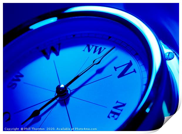 close up of a compass with a blue tone effect Print by Phill Thornton