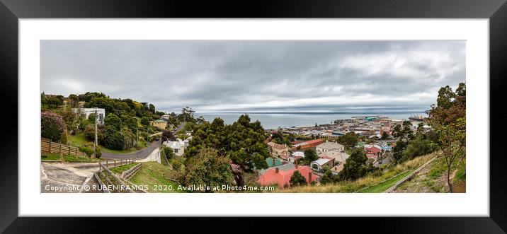 Panoramic view of the city center and port of Burn Framed Mounted Print by RUBEN RAMOS