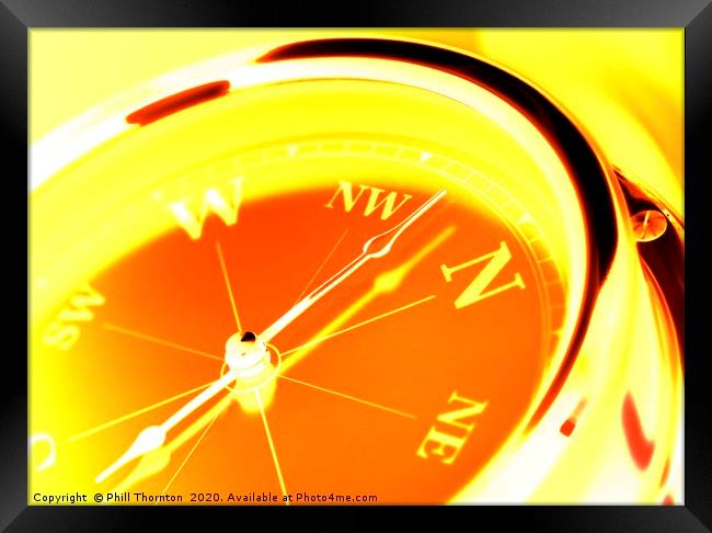 Negative image ofclose up of a compass with a blue Framed Print by Phill Thornton