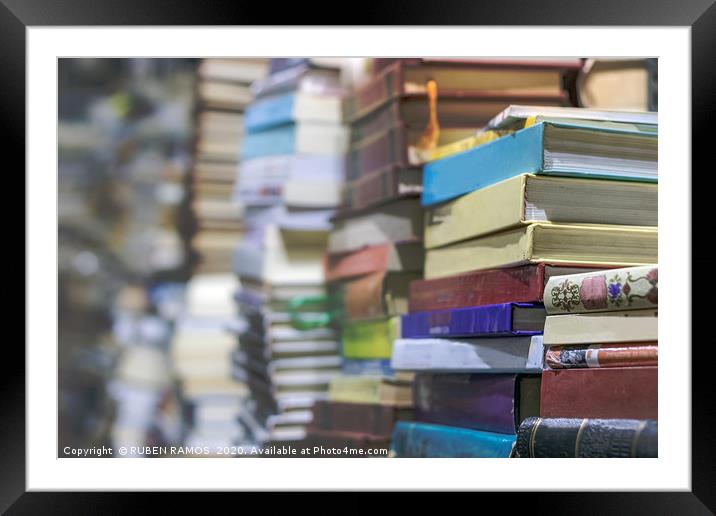 Close-up of stacks of old books, selective focus. Framed Mounted Print by RUBEN RAMOS