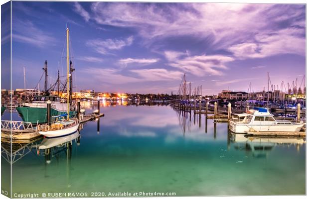 Sailboats moored on a peaceful harbor in Australia Canvas Print by RUBEN RAMOS