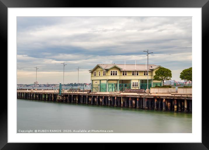 Long exposure of the Princess Pier over a cloudy d Framed Mounted Print by RUBEN RAMOS