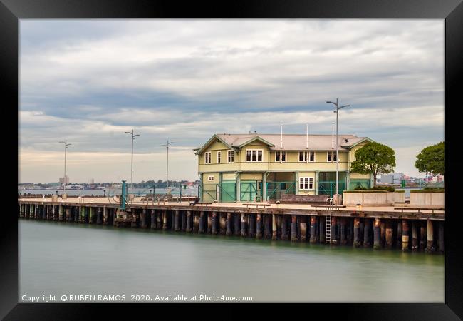 Long exposure of the Princess Pier over a cloudy d Framed Print by RUBEN RAMOS
