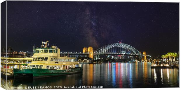Panoramic view of the Sydney Harbour at a starry n Canvas Print by RUBEN RAMOS