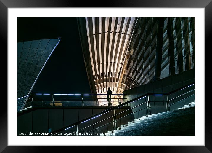 Silhouette of a man standing under roof, Sydney.  Framed Mounted Print by RUBEN RAMOS