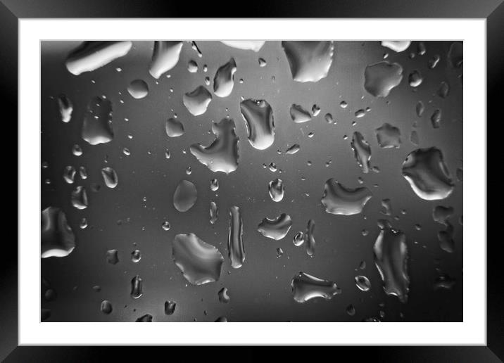 Raindrops Close-up on a Glass Window Framed Mounted Print by Rob Cole