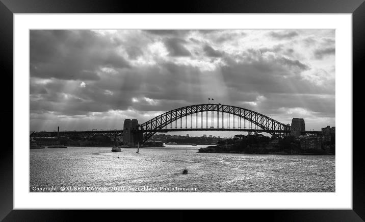 The Sydney Harbour Bridge under clouds.  Framed Mounted Print by RUBEN RAMOS
