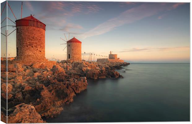 Rhodes Windmills and Fort at Sunrise Canvas Print by Antony McAulay