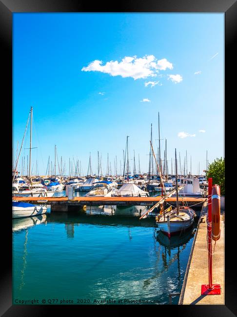 Beautiful luxury yachts and motor boats anchored i Framed Print by Q77 photo
