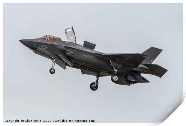 F-35 Lightning II in the hover at RAF Fairford Print by Clive Wells
