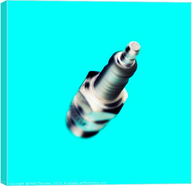 Abstract view of a spark plug on light blue Canvas Print by Phill Thornton