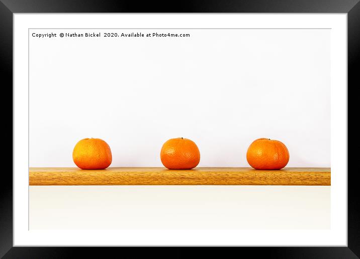 Three Oranges on a Shelf Framed Mounted Print by Nathan Bickel