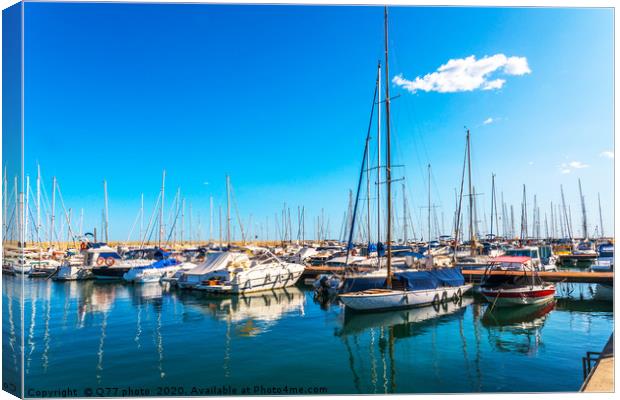 Beautiful luxury yachts and motor boats anchored i Canvas Print by Q77 photo