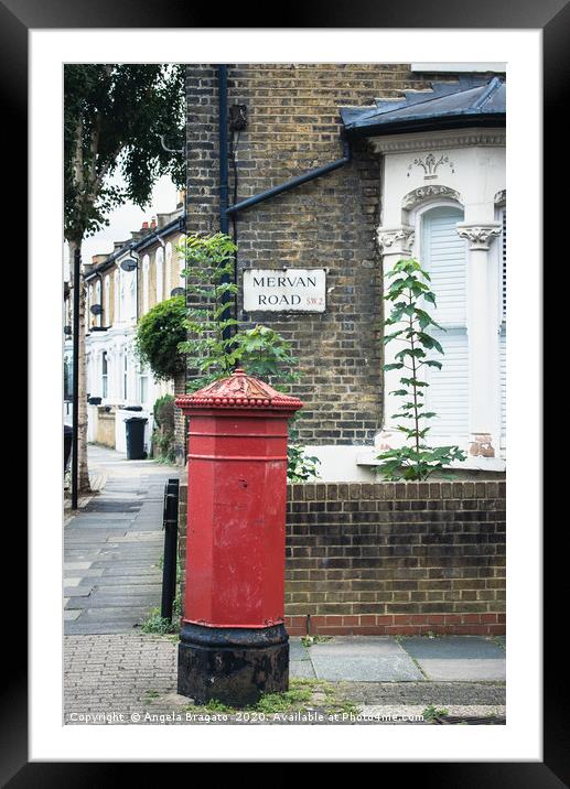 Red post box in Mervan Road, London Framed Mounted Print by Angela Bragato