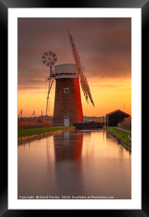 Winter sunset over Horsey Mill Framed Mounted Print by David Powley