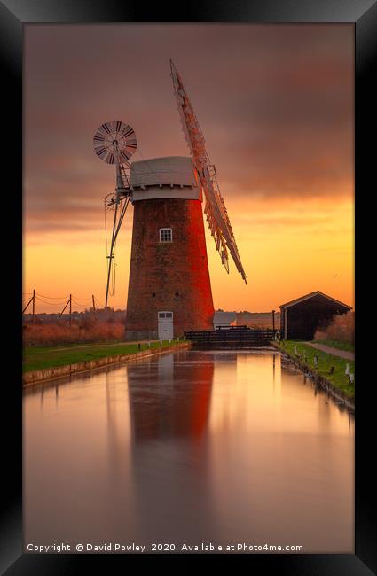 Winter sunset over Horsey Mill Framed Print by David Powley
