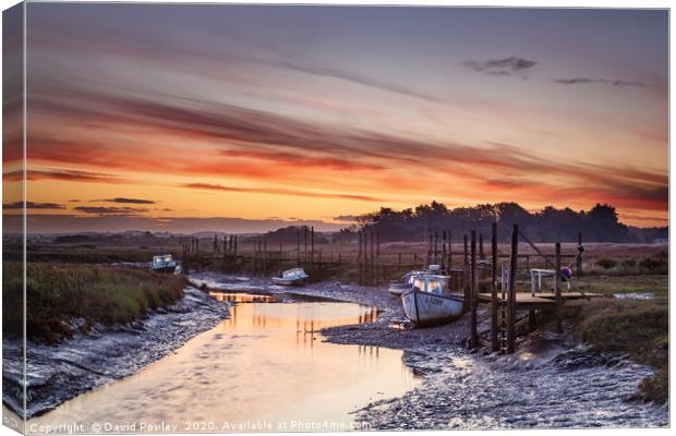 Low tide sunrise at Thornham Canvas Print by David Powley