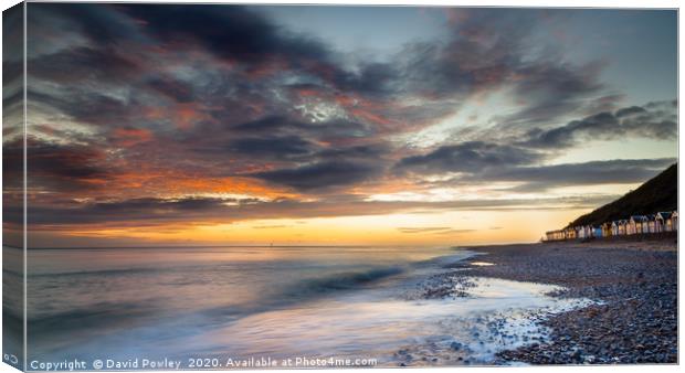 Dawn sky over Cromer Beach Canvas Print by David Powley