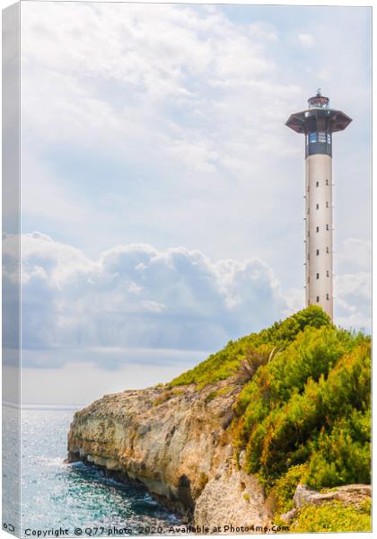Lighthouse tower and blue summer sky, the safe ret Canvas Print by Q77 photo
