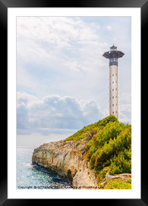 Lighthouse tower and blue summer sky, the safe ret Framed Mounted Print by Q77 photo