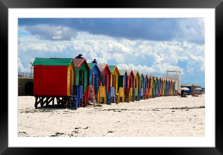 Multicoloured cabins in the beach Framed Mounted Print by Theo Spanellis